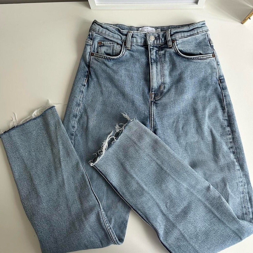 High-Waisted Distressed Denim Jeans